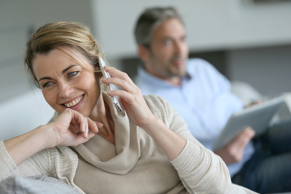 Couple calling our inspector to talk about their home inspection 